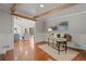 This home office has a work space and a view of the living room at 6265 Reives Rd, Cumming, GA 30041