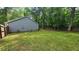 View of the backyard showcasing a level lawn, and privacy fence, perfect for outdoor activities at 2849 Appling Way, Kennesaw, GA 30152