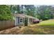 Picturesque home featuring a combination of lush greenery and a well-maintained lawn for a scenic view at 2849 Appling Way, Kennesaw, GA 30152