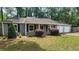 Inviting single-level home with a well-kept yard, and a 2-car garage offering convenient parking at 2849 Appling Way, Kennesaw, GA 30152