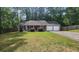 Charming single-story home featuring a 2-car garage, landscaped front yard, and inviting front porch at 2849 Appling Way, Kennesaw, GA 30152