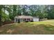 Charming single-story home features a well-maintained lawn, a two-car garage, and a classic gray exterior at 2849 Appling Way, Kennesaw, GA 30152