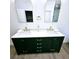 Bathroom boasting a dual sink vanity with white countertop and gold fixtures and hardware at 261 Arborview Dr, Mcdonough, GA 30252