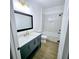 Modern bathroom featuring a stylish vanity with quartz countertop, and a tiled shower/tub combo at 261 Arborview Dr, Mcdonough, GA 30252