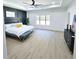 Spacious main bedroom features natural light at 261 Arborview Dr, Mcdonough, GA 30252