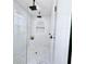 The walk-in shower has dual shower heads, marble look tile, and a shampoo nook at 261 Arborview Dr, Mcdonough, GA 30252