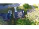 Aerial view showcasing the home's roof and driveway, with surrounding greenery and neighborhood streets at 5229 Mountain Village Ct, Stone Mountain, GA 30083