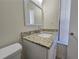 Bathroom with a modern vanity and granite countertop at 5229 Mountain Village Ct, Stone Mountain, GA 30083