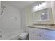 Modern bathroom featuring a shower and granite countertops at 5229 Mountain Village Ct, Stone Mountain, GA 30083