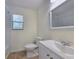 Clean bathroom with modern sink and tiled floor near shower at 5229 Mountain Village Ct, Stone Mountain, GA 30083