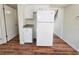 Kitchen area featuring white refrigerator and granite countertop at 5229 Mountain Village Ct, Stone Mountain, GA 30083