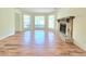 Bright living room boasts a cozy fireplace and beautiful flooring at 5229 Mountain Village Ct, Stone Mountain, GA 30083