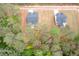 Aerial view of two homes nestled in a wooded area with large yards at 110 Doris Path, Dallas, GA 30157