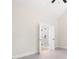 Bathroom with shower behind a glass door and new floors covered with plastic at 110 Doris Path, Dallas, GA 30157