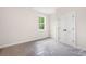 A bright bedroom featuring a window and closet at 110 Doris Path, Dallas, GA 30157