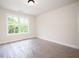 Bright bedroom features a window at 110 Doris Path, Dallas, GA 30157