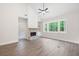 Living room with stone fireplace, vaulted ceiling, and lots of natural light at 110 Doris Path, Dallas, GA 30157