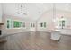 Spacious living room with vaulted ceilings, hardwood floors, and ample natural light at 110 Doris Path, Dallas, GA 30157