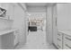 Hallway with custom built-in cabinets and views of the kitchen at 2023 Stoneleigh Dr, Stone Mountain, GA 30087