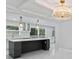 Open-concept kitchen with large island, modern lighting, and stainless steel appliances at 2023 Stoneleigh Dr, Stone Mountain, GA 30087