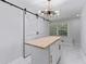 Chic pantry with butcher block island and barn door at 2023 Stoneleigh Dr, Stone Mountain, GA 30087