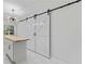 Chic pantry with butcher block island and barn door at 2023 Stoneleigh Dr, Stone Mountain, GA 30087