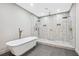 Modern bath featuring soaking tub, glass-enclosed shower, and sleek fixtures at 3139 Alston Dr, Decatur, GA 30032