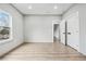 Spacious bedroom showcasing a walk-in closet and neutral wall color at 3139 Alston Dr, Decatur, GA 30032
