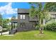 Modern two-story home featuring sleek lines and ample windows for natural light at 3139 Alston Dr, Decatur, GA 30032