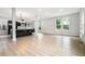 Spacious open-concept kitchen featuring sleek, modern cabinetry, an island and wood flooring at 3139 Alston Dr, Decatur, GA 30032