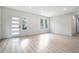 Bright and airy living room featuring stylish wood floors and modern recessed lighting at 3139 Alston Dr, Decatur, GA 30032