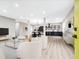 Bright and airy living room with modern furniture and an open-concept kitchen at 3139 Alston Dr, Decatur, GA 30032