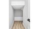 Bright, unfinished storage space with light wood-look flooring and a small alcove at 3139 Alston Dr, Decatur, GA 30032