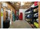 Unfinished basement space featuring essential utilities and storage shelves at 33 Kay Ne Rd, White, GA 30184