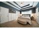 Spacious main bedroom with ensuite bath, tray ceiling, and ample natural light from large windows at 33 Kay Ne Rd, White, GA 30184