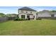 A spacious lawn and outdoor seating area highlight this fenced backyard at 800 Ivy Crest Ln, Canton, GA 30115