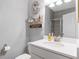 Charming half bath with gray walls, modern fixtures, and cute decorative elements at 800 Ivy Crest Ln, Canton, GA 30115