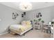 Comfortable bedroom with a desk, shelf, and plenty of space for storage at 800 Ivy Crest Ln, Canton, GA 30115