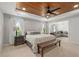 Spacious bedroom boasting a wood tray ceiling, carpet floors, and large bed at 800 Ivy Crest Ln, Canton, GA 30115