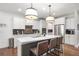 Beautiful kitchen with a large island, pendant lighting, and stainless steel appliances at 800 Ivy Crest Ln, Canton, GA 30115