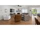 Spacious living room with shiplap walls, hardwood floors, a cozy fireplace, and ample seating at 800 Ivy Crest Ln, Canton, GA 30115