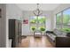 Comfortable sitting area with hardwood floors, large windows, and backyard views at 800 Ivy Crest Ln, Canton, GA 30115