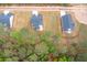 Aerial view showcasing three single-Gathering homes, long driveways, lawns, and the surrounding trees at 130 Doris Path, Dallas, GA 30157