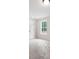 Bright bedroom features a large window overlooking wooded area at 130 Doris Path, Dallas, GA 30157