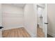 Walk-in closet with wire shelving and access to the utility room at 130 Doris Path, Dallas, GA 30157