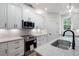 Kitchen featuring stainless steel appliances, granite countertops, and white subway tile backsplash at 130 Doris Path, Dallas, GA 30157