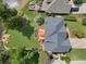 Aerial view of a home that features a large outdoor entertaining area on the lake at 2436 Camden Lake Nw Vw, Acworth, GA 30101