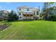 Spacious backyard with a well-maintained lawn and deck, perfect for outdoor activities at 2436 Camden Lake Nw Vw, Acworth, GA 30101