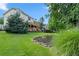 Spacious backyard with a multi-level deck overlooking a beautifully landscaped lawn and garden at 2436 Camden Lake Nw Vw, Acworth, GA 30101