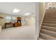 Spacious basement featuring carpet and a staircase, ideal for a recreation or living area at 2436 Camden Lake Nw Vw, Acworth, GA 30101